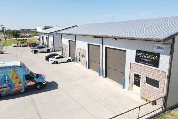 Modern flex space warehouse with multiple bays, parking, and loading docks designed for multi-tenant industrial use in 2025