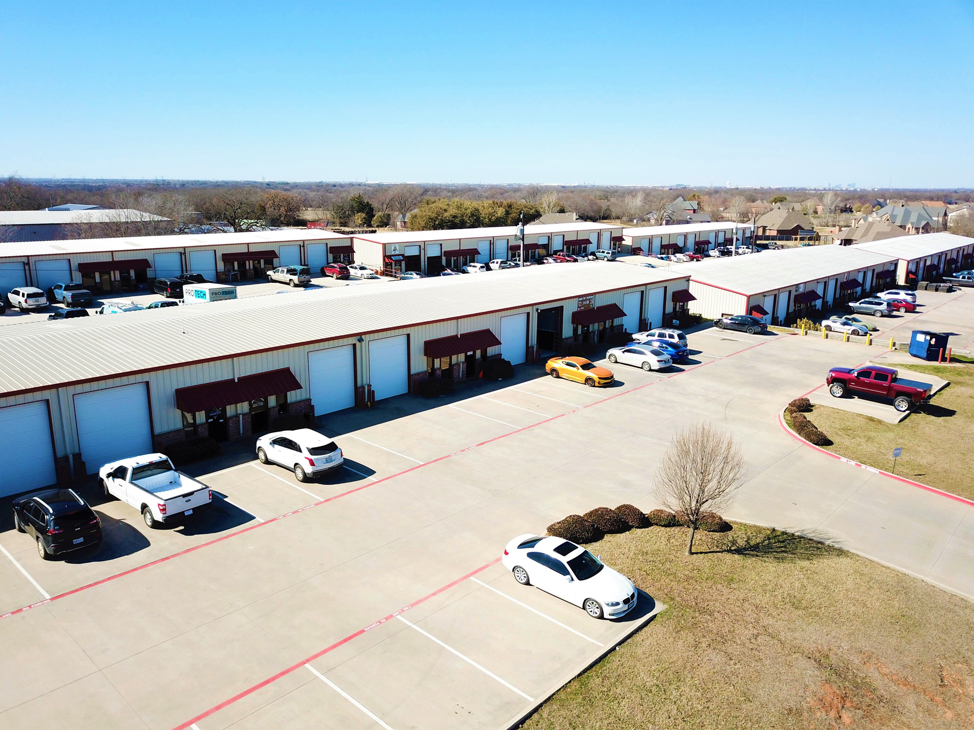 Modern flex space building with roll up doors and handicapped parking
